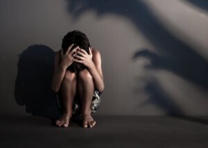 Fearful shadows scaring a child.