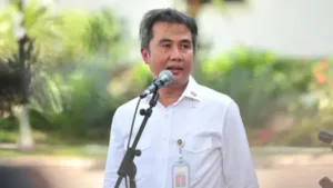 Bey-Triadi-Machmudin