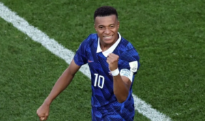 mbappe-kepal-tangan-xinhua